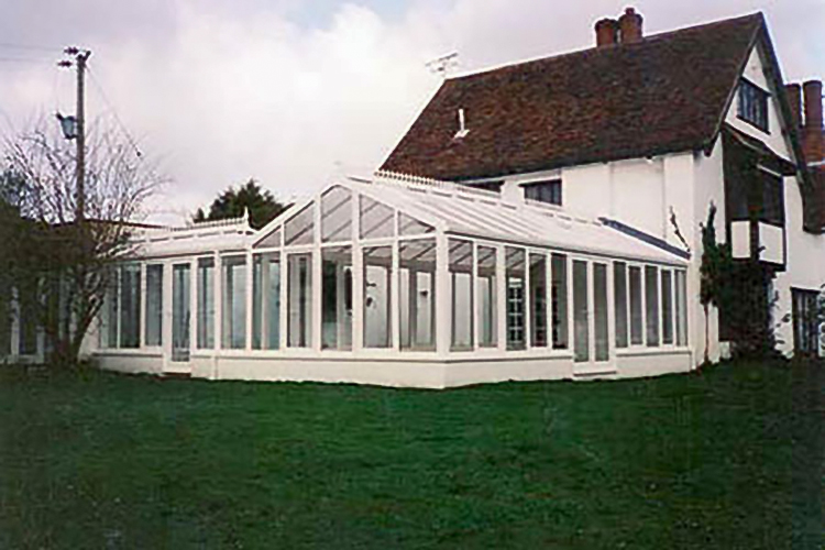 White PVCu Georgian Gable Combination Conservatory with 25mm Opal polycarbonate roof sheets & French doors